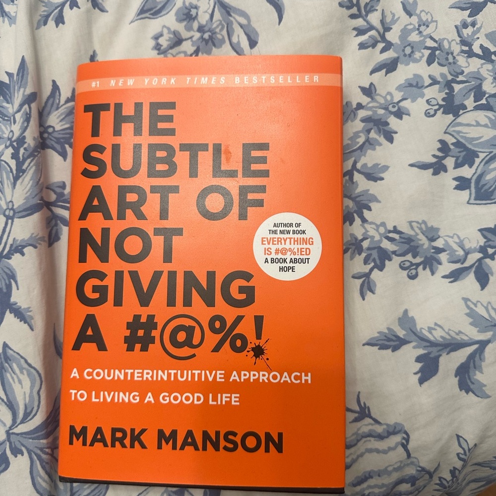 Orange Book with Black Text
